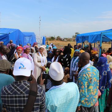 Artist speaking on stage about the Great Green Wall
